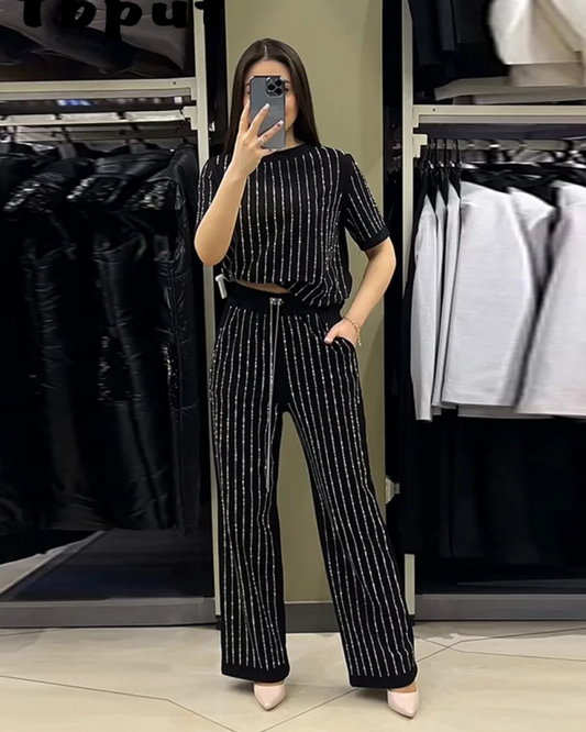Conjunto casual de duas peças com calças e camisa de manga curta para mulher