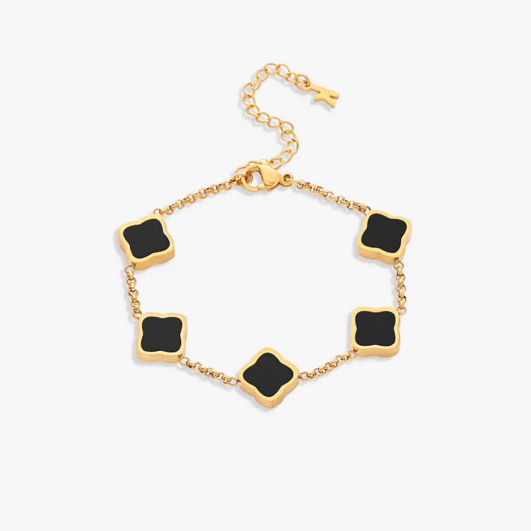 Pulseira em forma de trevo com detalhes dourados